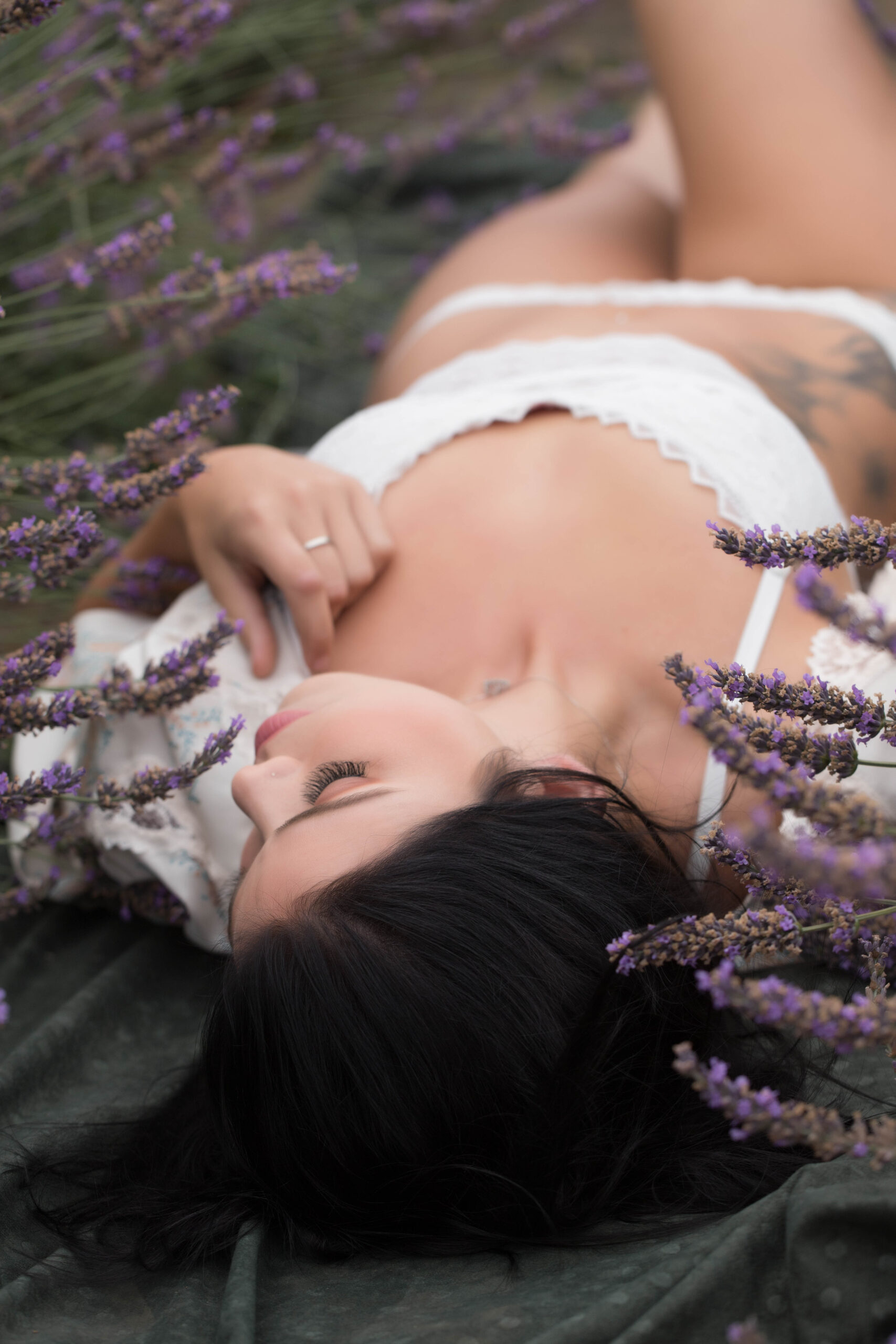 woman lying in lavender in lingerie