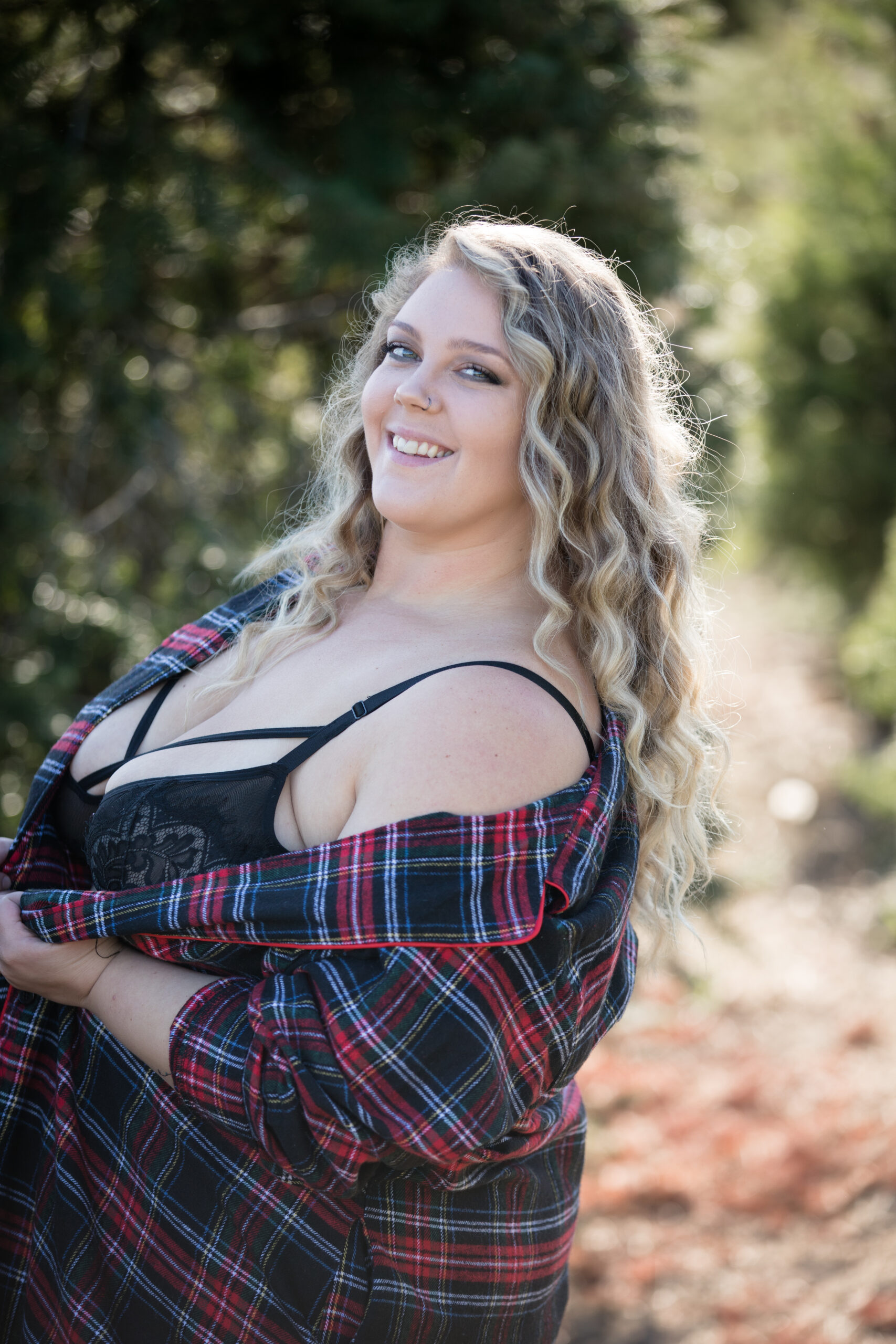 plus size boudoir outdoor in tree farm