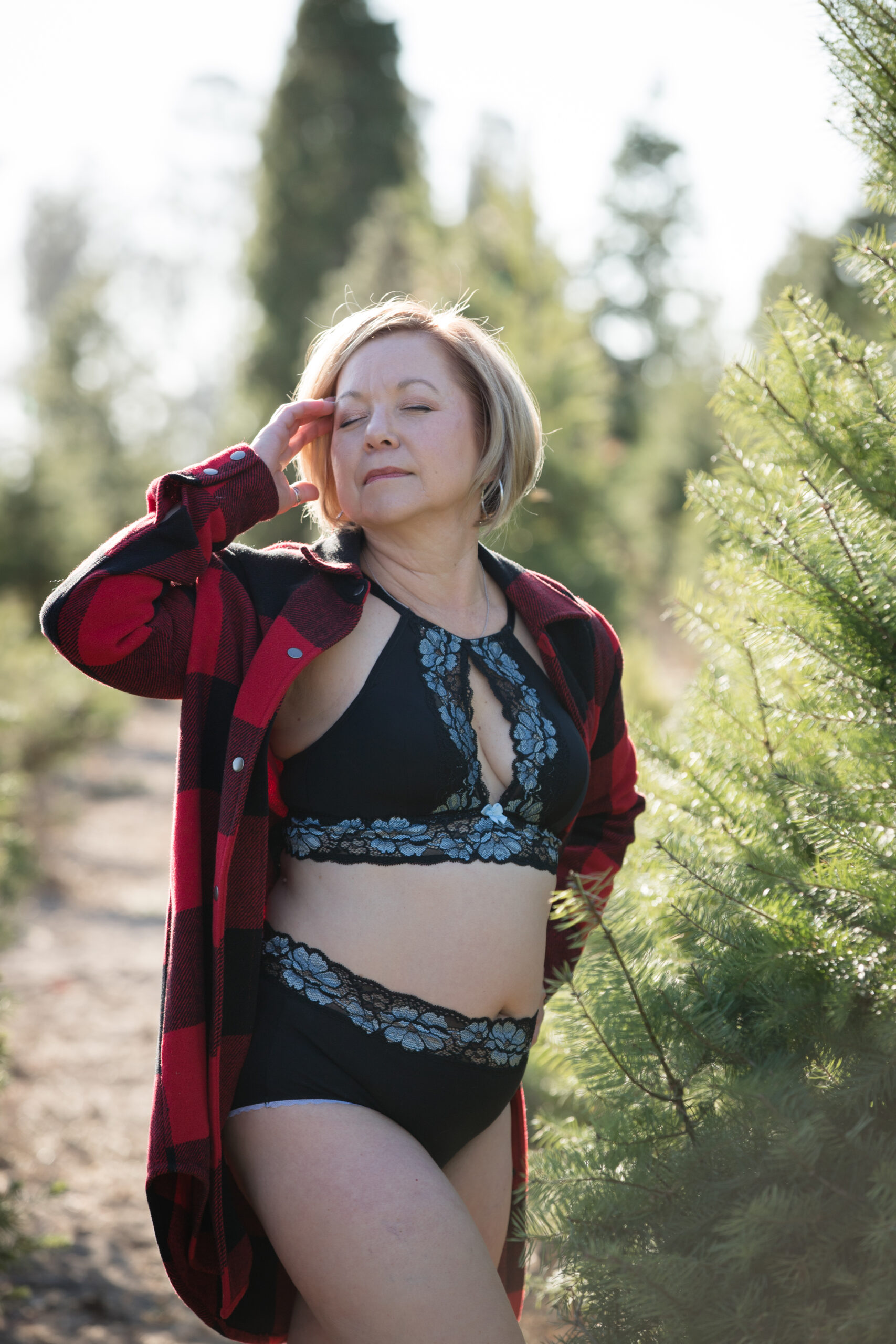 woman in Christmas tree farm