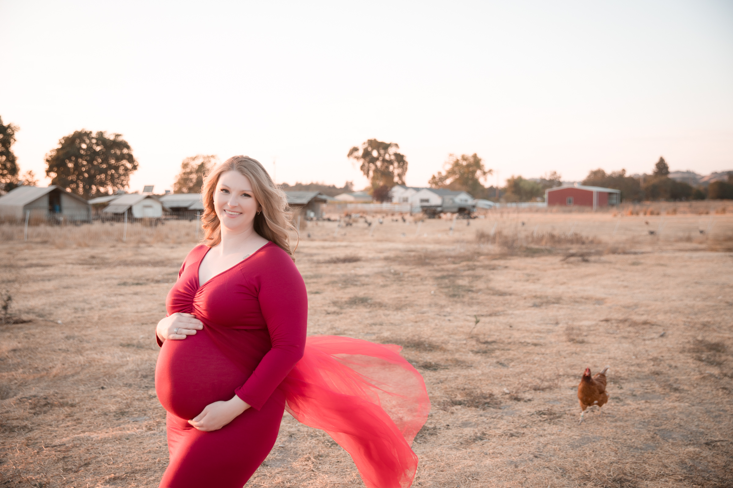 red gown grass woman